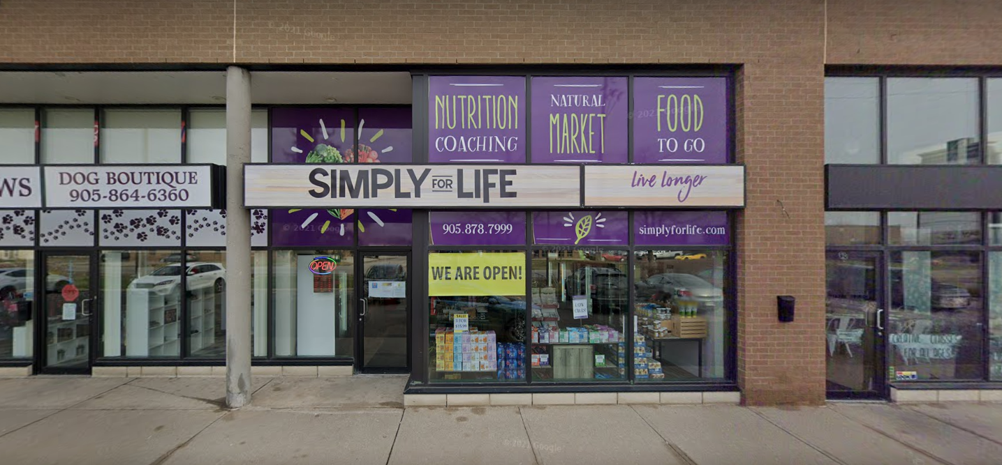 Outside storefront of Simply For Life health food store.