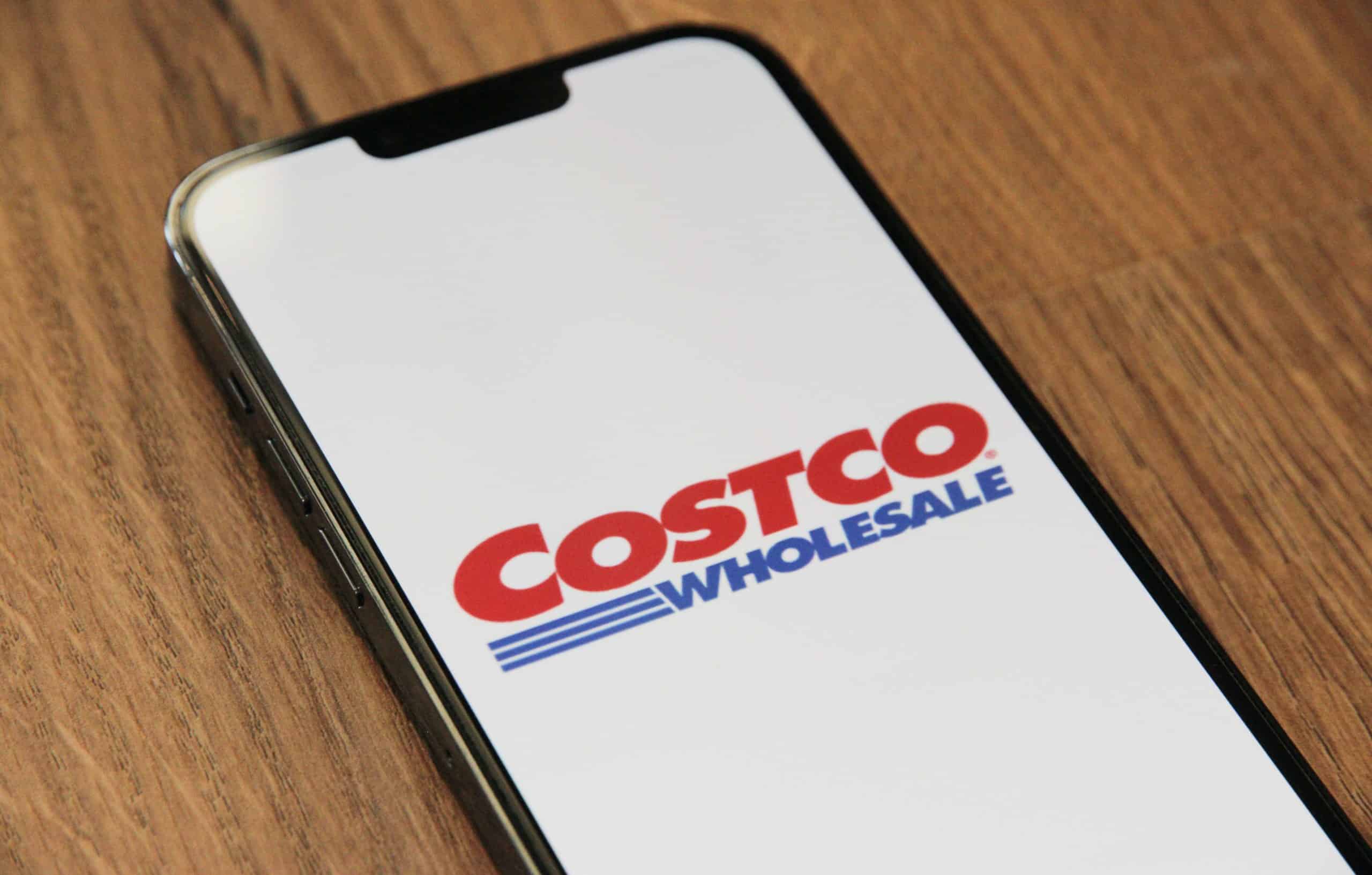 cellphone with costco logo on the screen