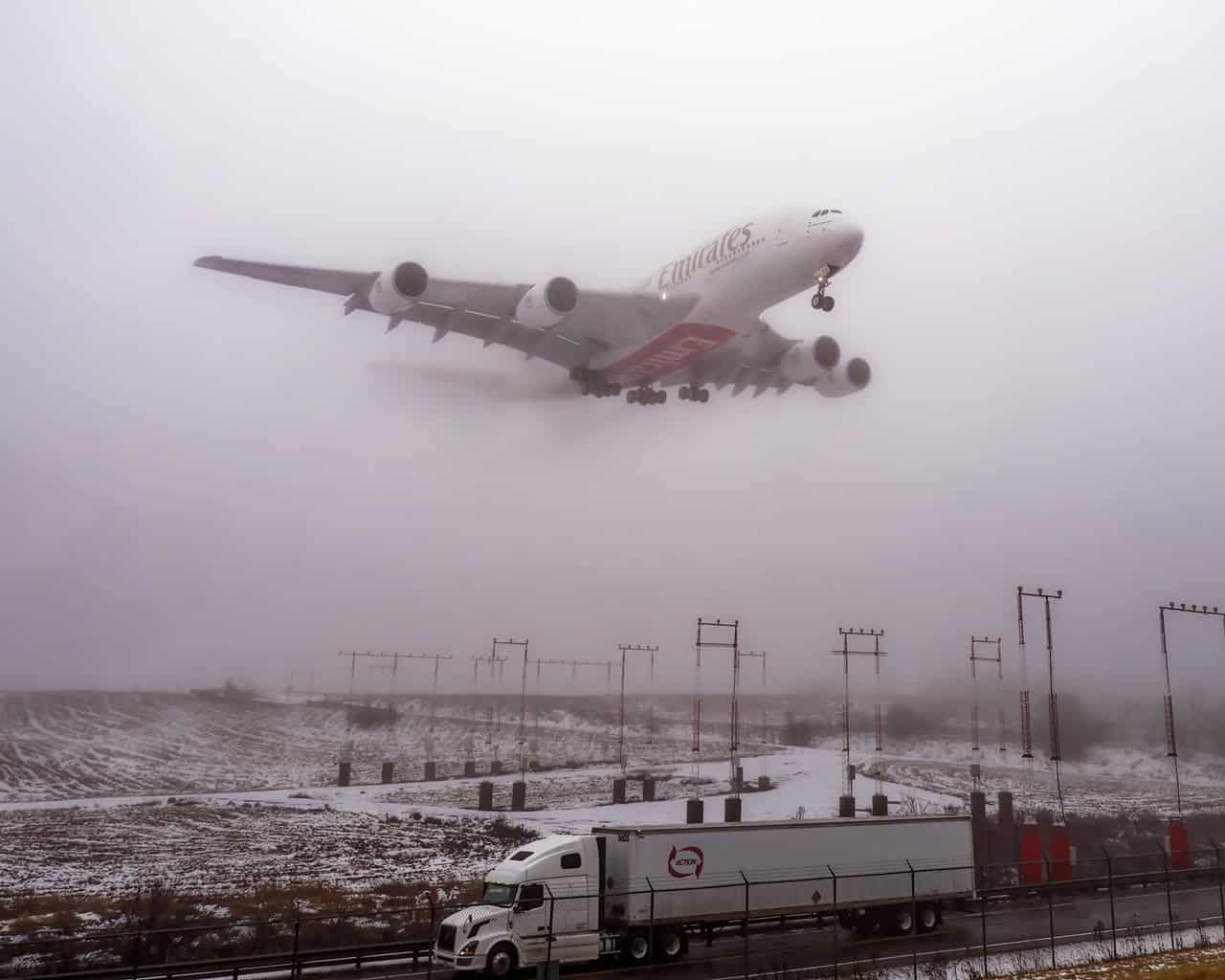 Airbus A380 flight arrives through the heavy fog at Pearson Airport in Mississauga