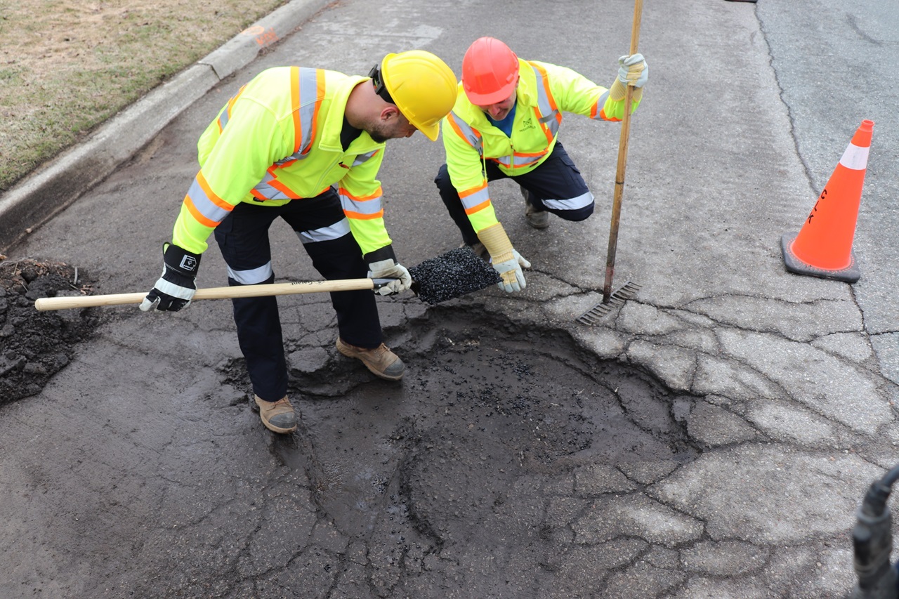 Filling in the potholes in Mississauga.