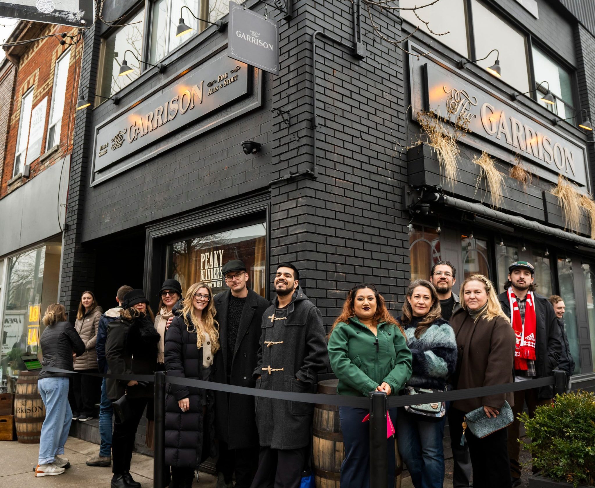 The Man of Kent pub on Ossington Avenue in Toronto was transformed into the 'Garrison' to celebrate the streaming release of Peaky Blinders: The Immortal Man