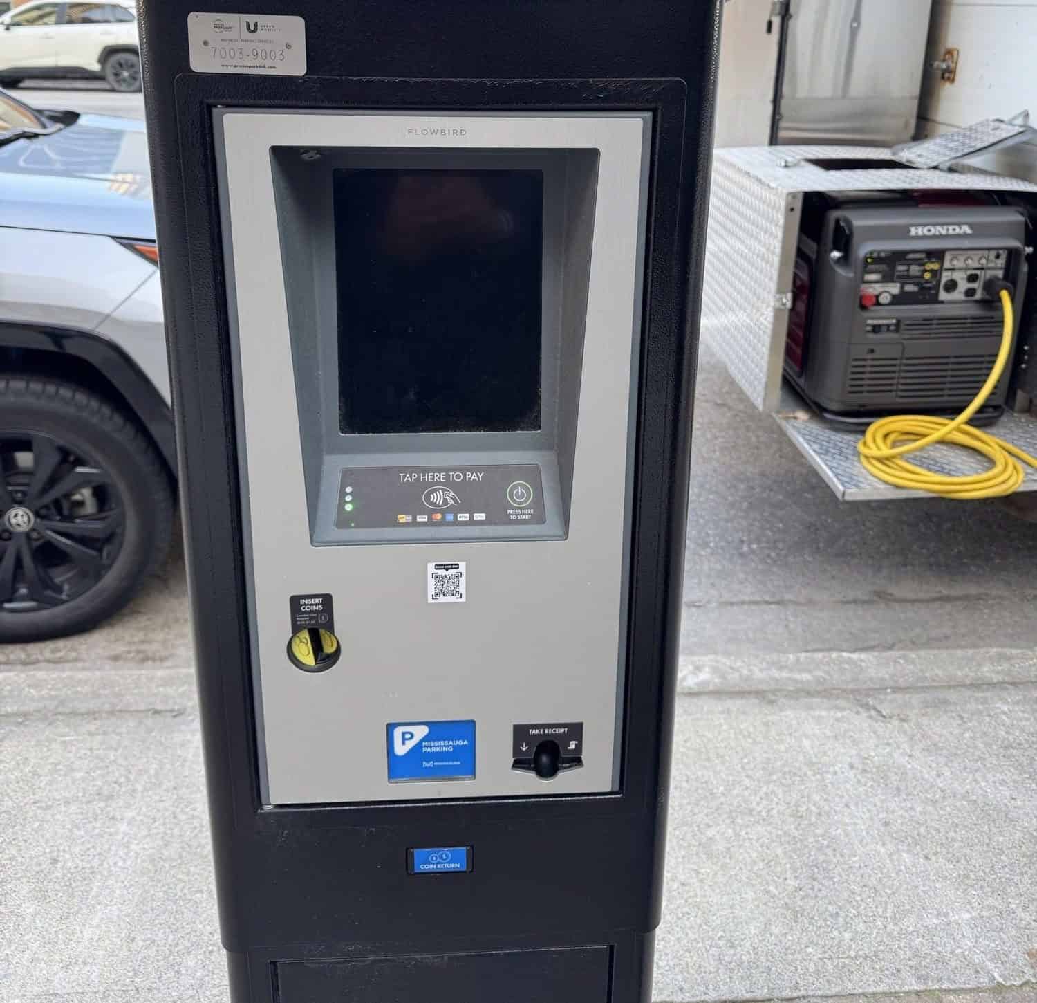 city warns about bogus QR code on mississauga parking machines.