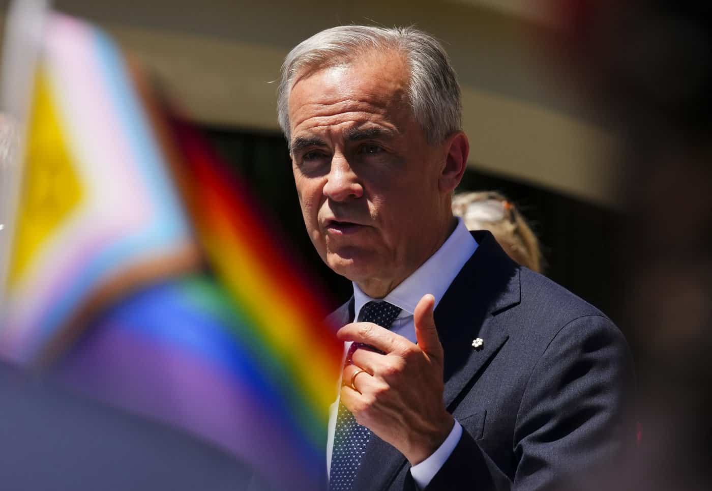 Carney, MPs raise Pride Flag on Parliament Hill