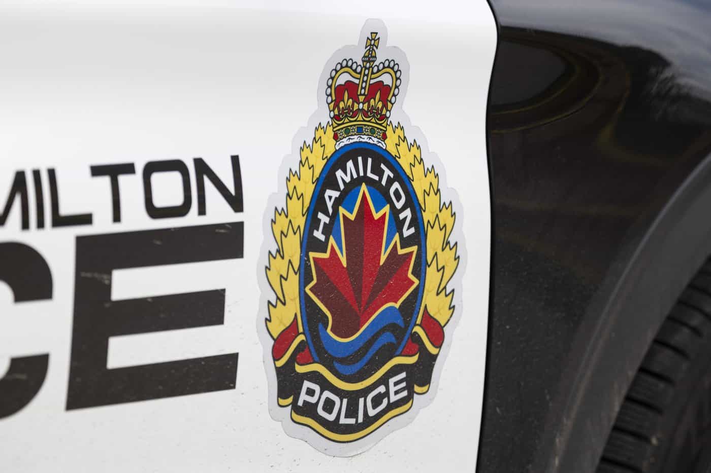 Man accused of crashing stolen U-Haul into Hamilton police cruisers and home